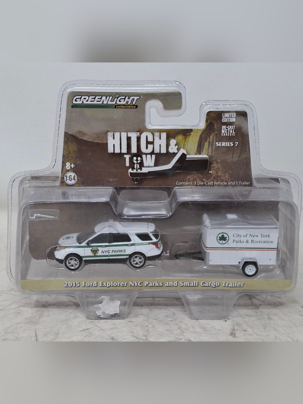 GreenLight 2015 Ford Explorer NYC Parks Die-Cast with Trailer - White & Green